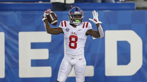 Mississippi Rebels wide receiver Elijah Moore (8) celebrates after a touchdown in overtime against Kentucky at Kroger Field. Mandatory Credit: Katie Stratman-USA TODAY Sports